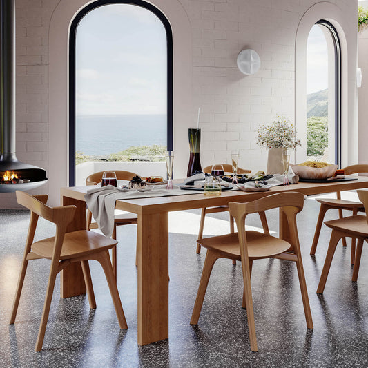 Melbourne-made dining table with sculptural steel base