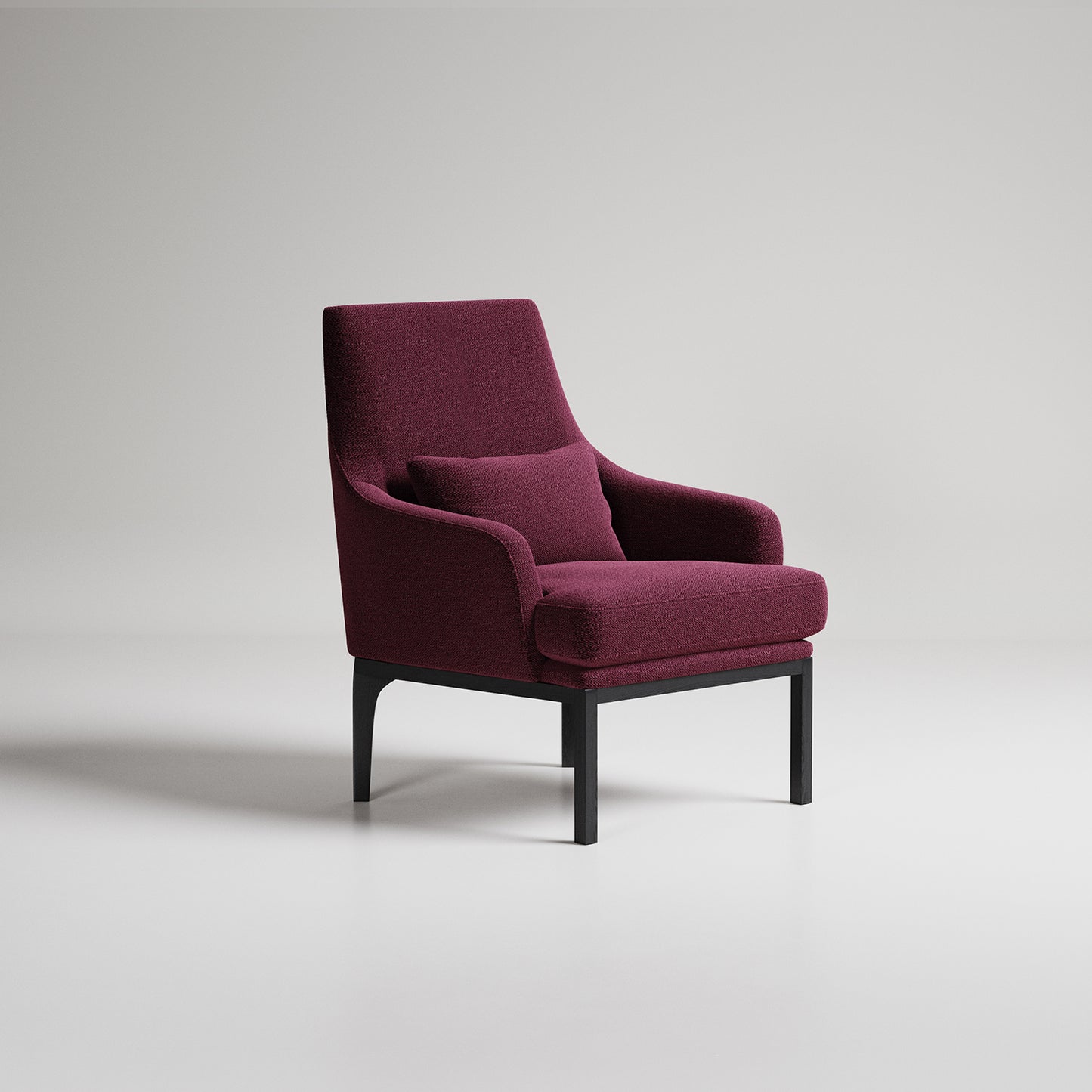 Modern burgundy velvet armchair with black metal legs on white background, studio product photography