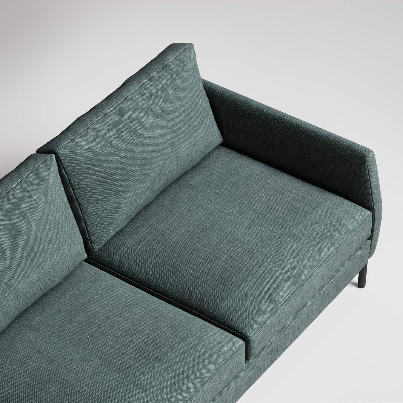 Modern sage green sectional sofa with clean lines and textured upholstery, viewed from above against white background