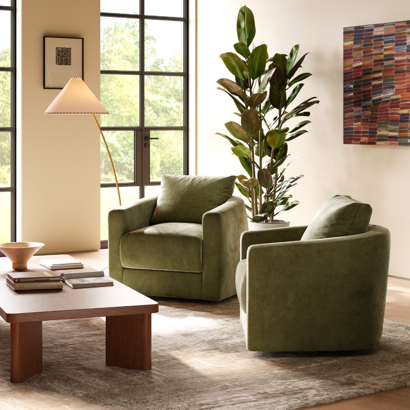 Modern living room with olive velvet swivel chairs, wooden coffee table, floor lamp, and tall rubber plant