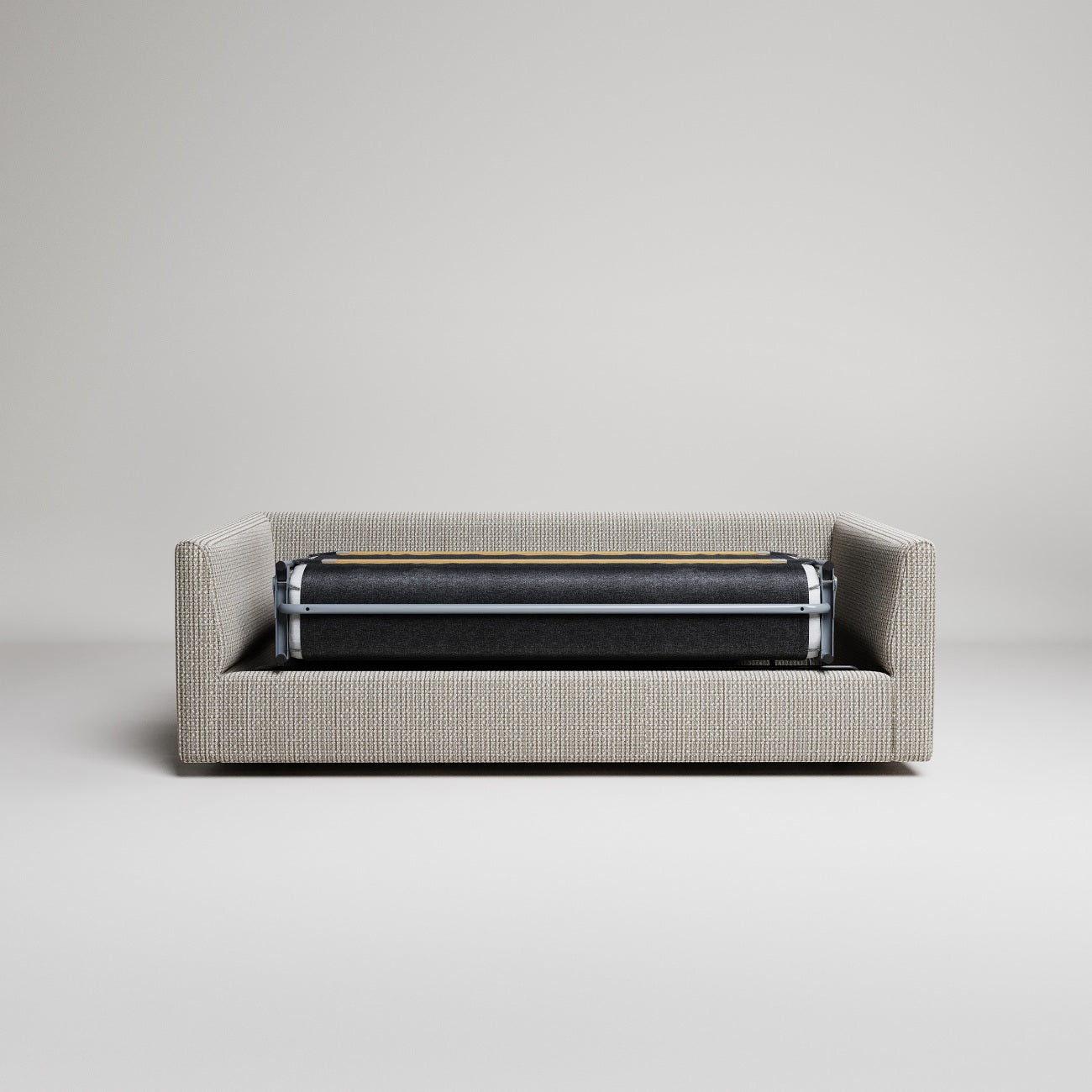 Light gray upholstered sofa bed with visible fold-out mattress mechanism against neutral background