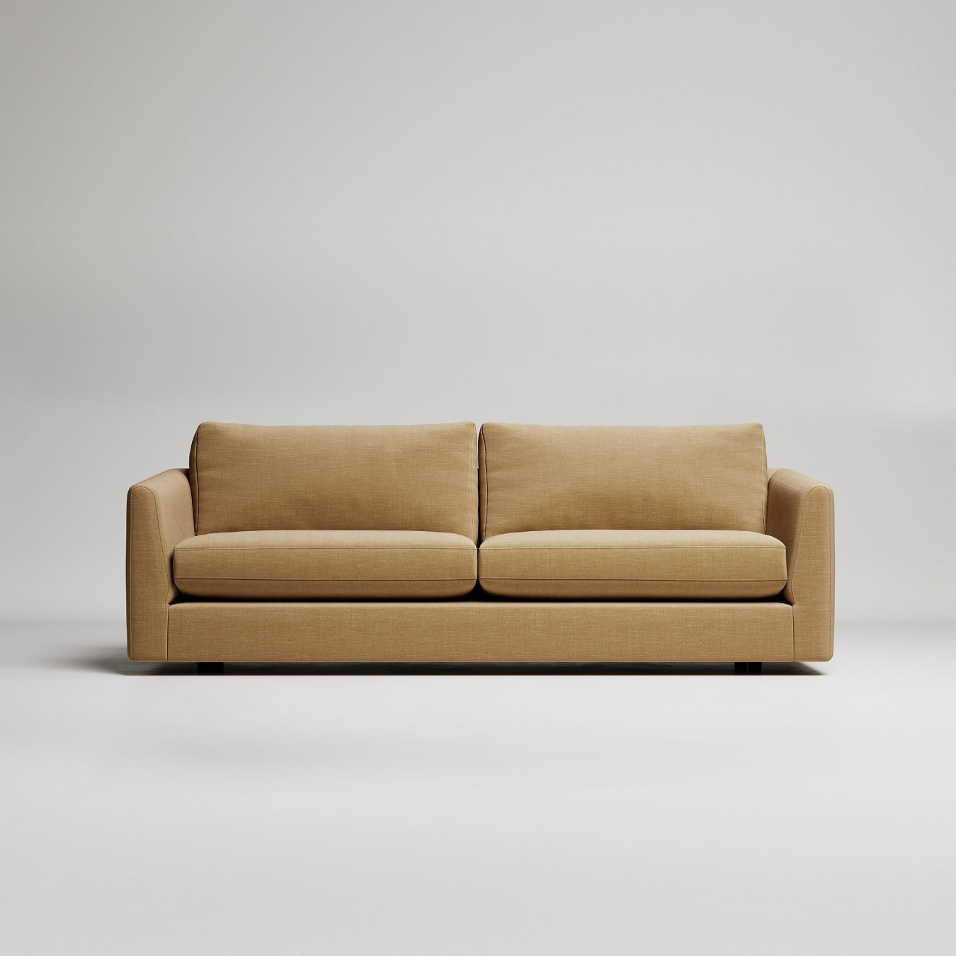 Modern tan linen sofa with clean lines on white background, studio product photography