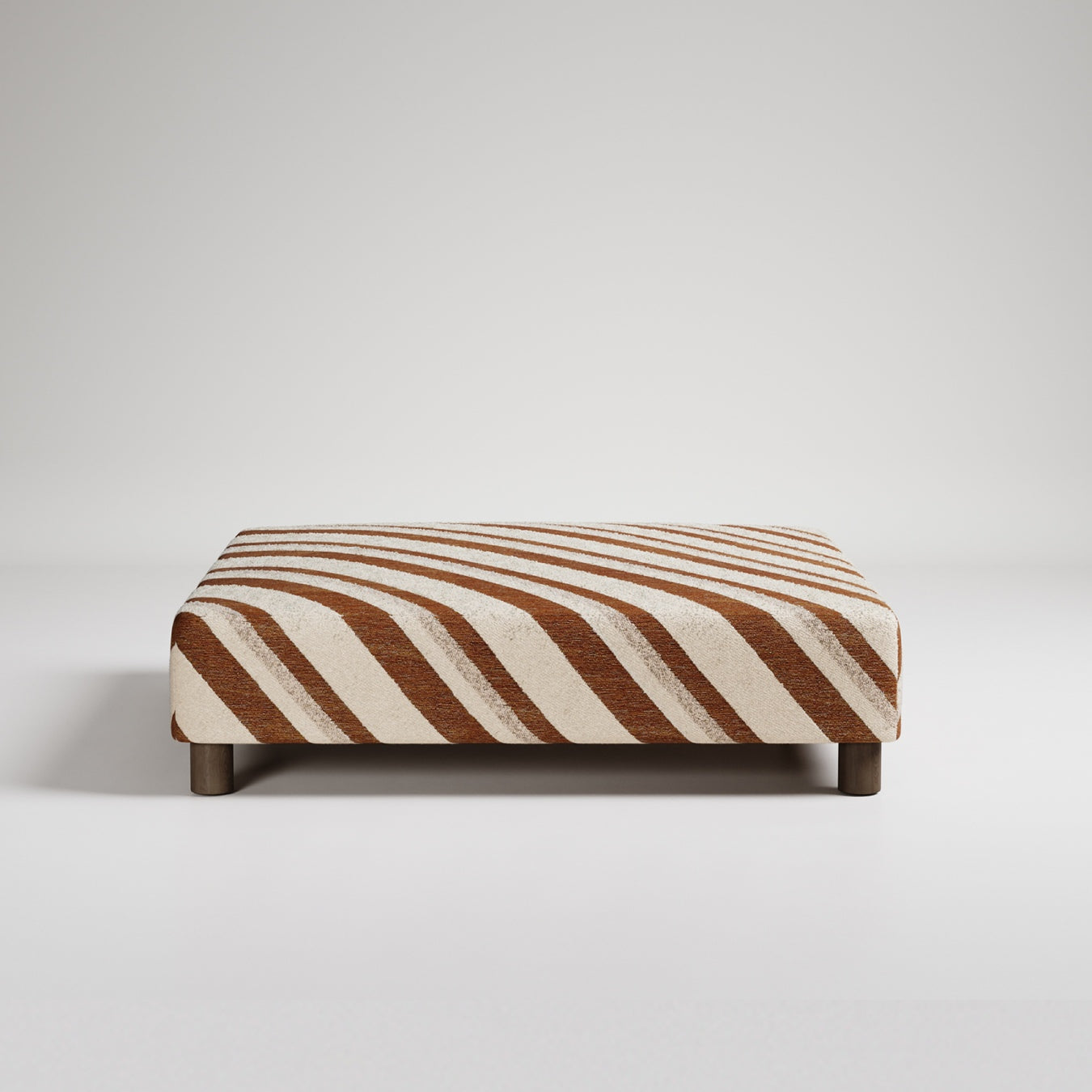 Patterned rectangular ottoman or coffee table with clean lines against white background