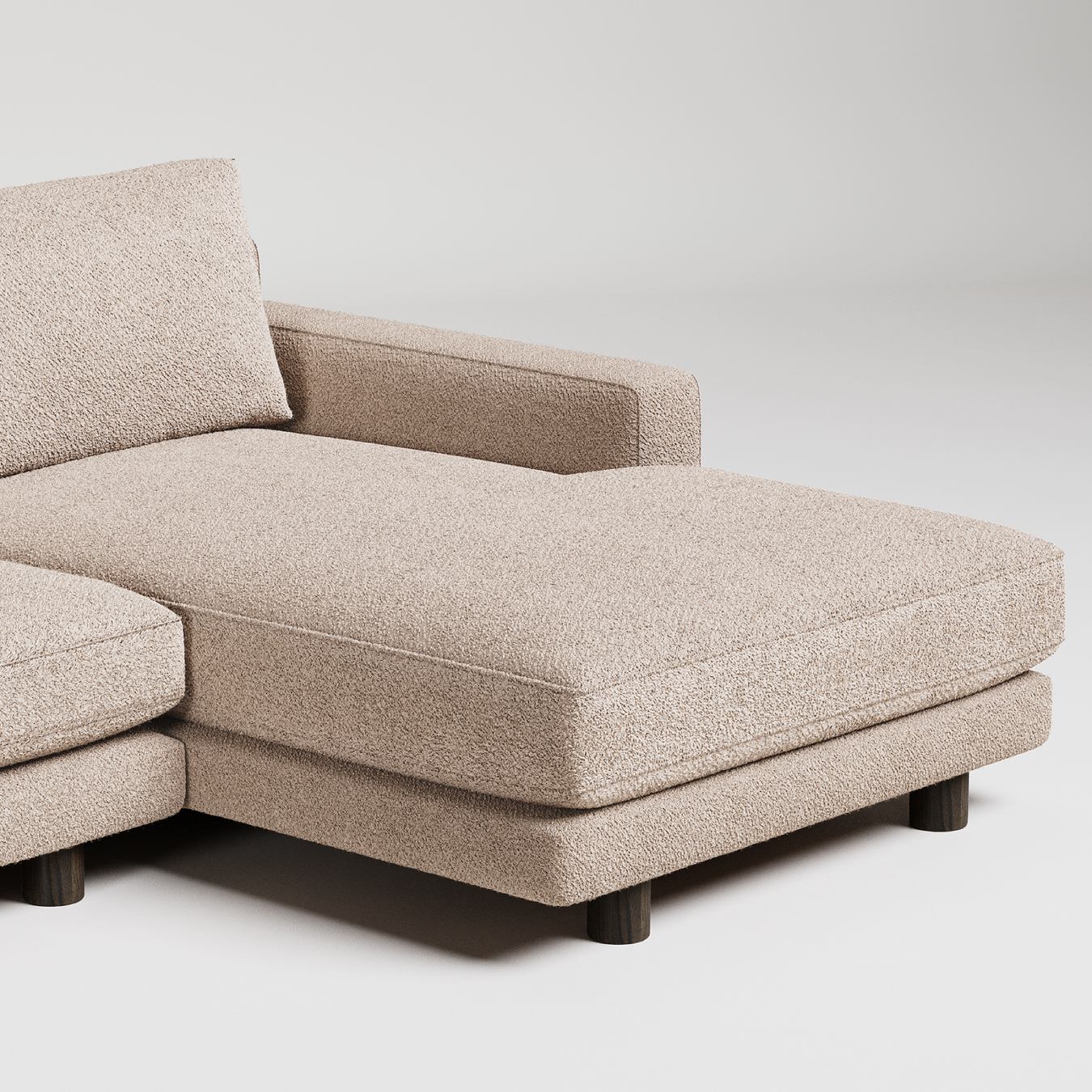 Beige sectional sofa on a white background