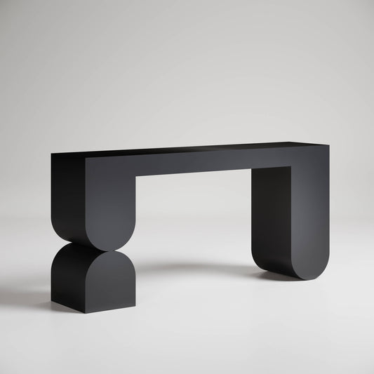 Modern black console table with curved geometric base legs and minimal design against light gray background