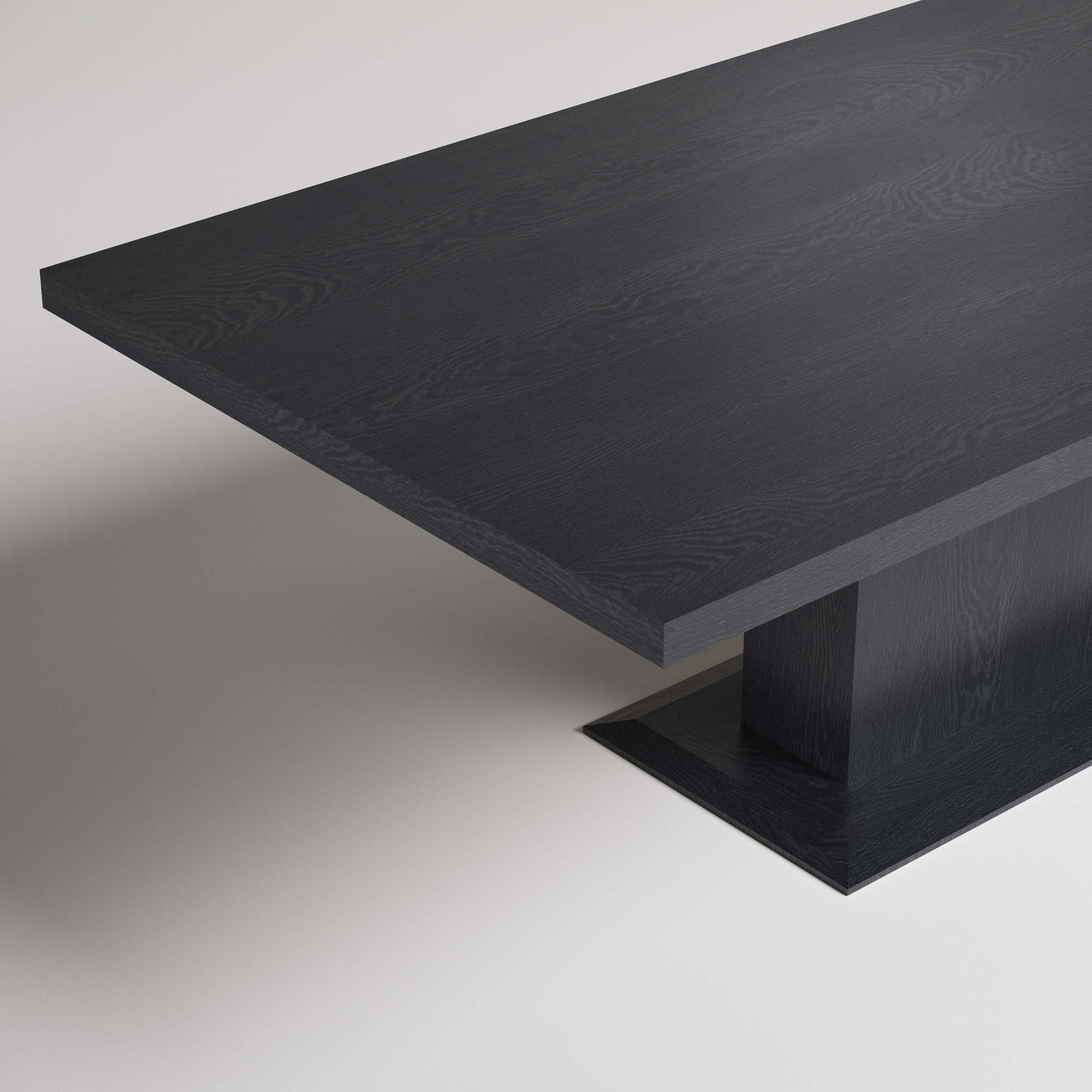 Modern black wood dining table with minimalist pedestal base, floating angle view against white background