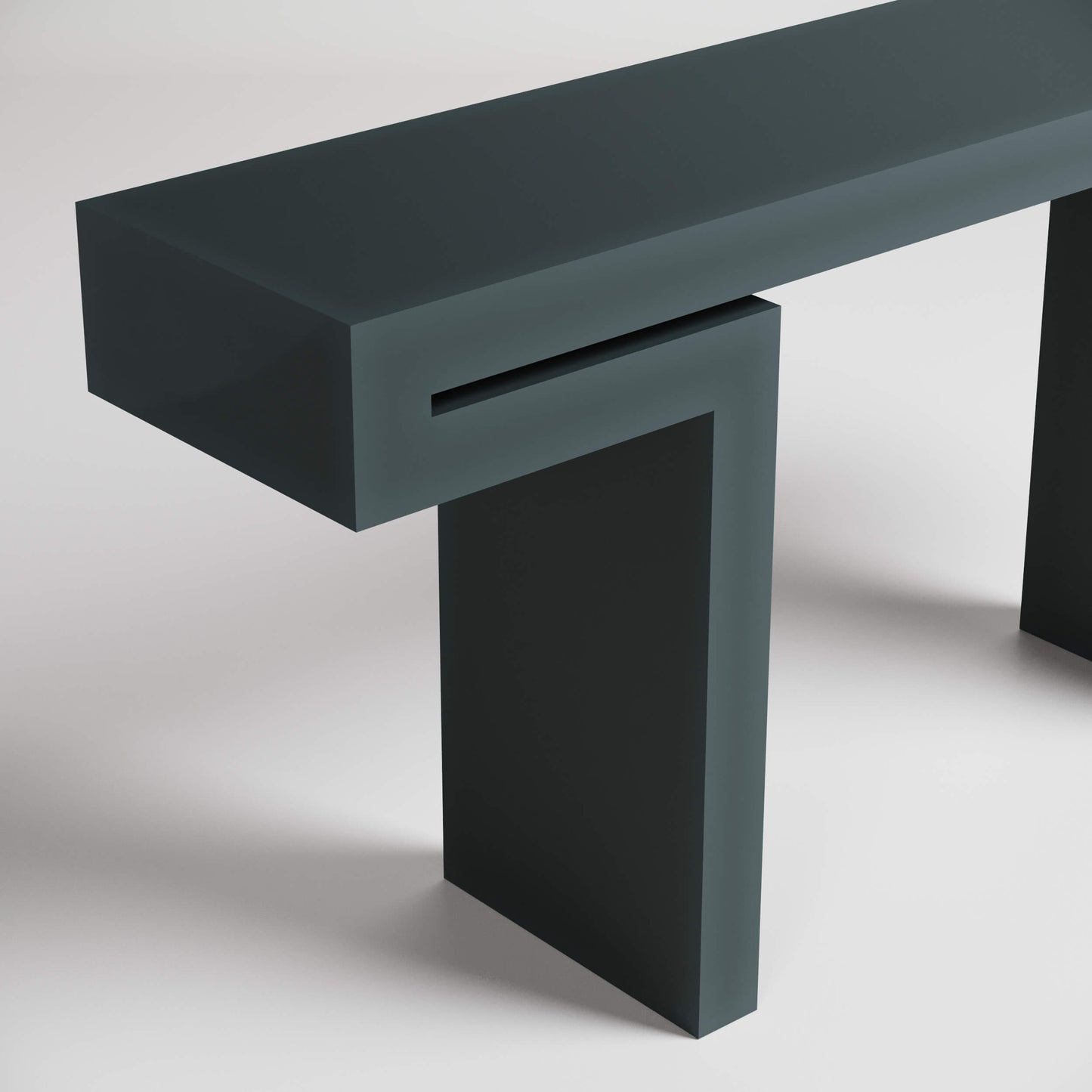 Modern minimalist dark green console table with geometric design and clean lines against white background.