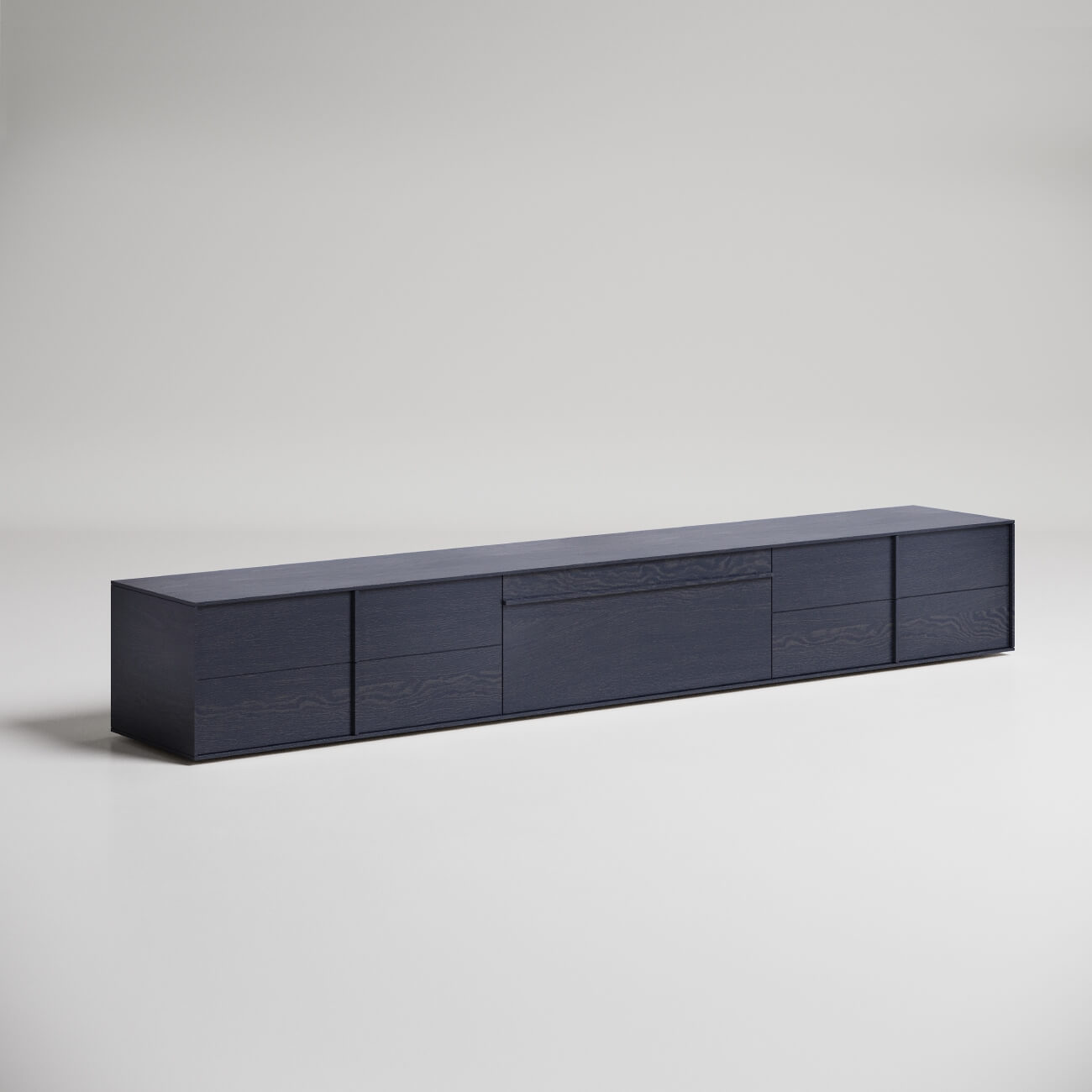 Modern low-profile dark wood media console with horizontal drawers against white background