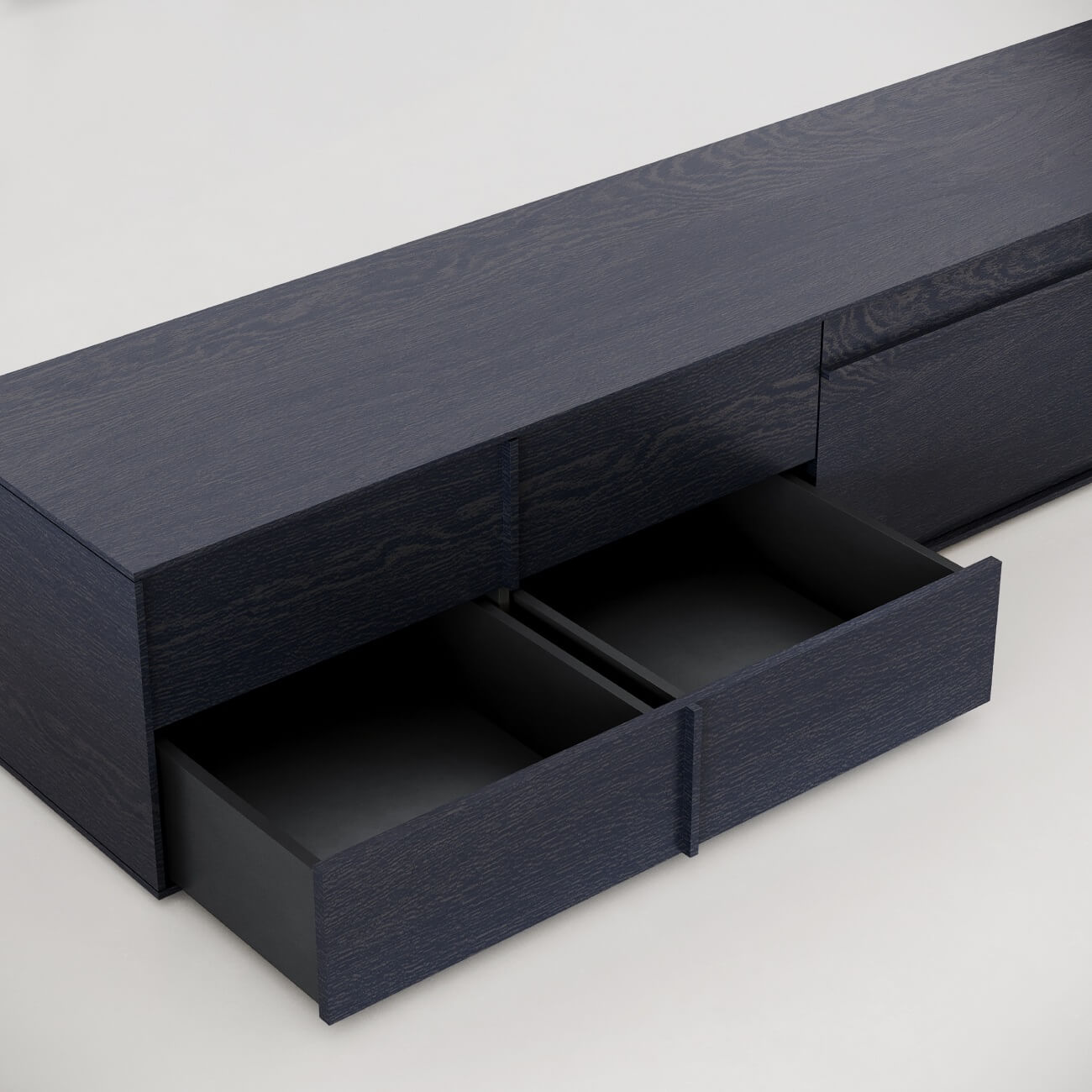 Sleek black wooden shelf unit with open drawer showing minimalist storage design against white background