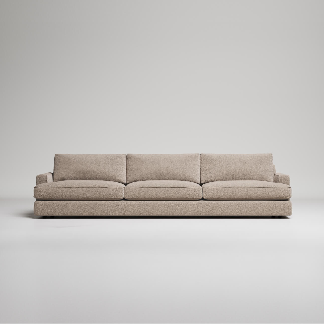 Modern 3-seater sofa in beige textured fabric, clean lines, against light gray background, minimalist style