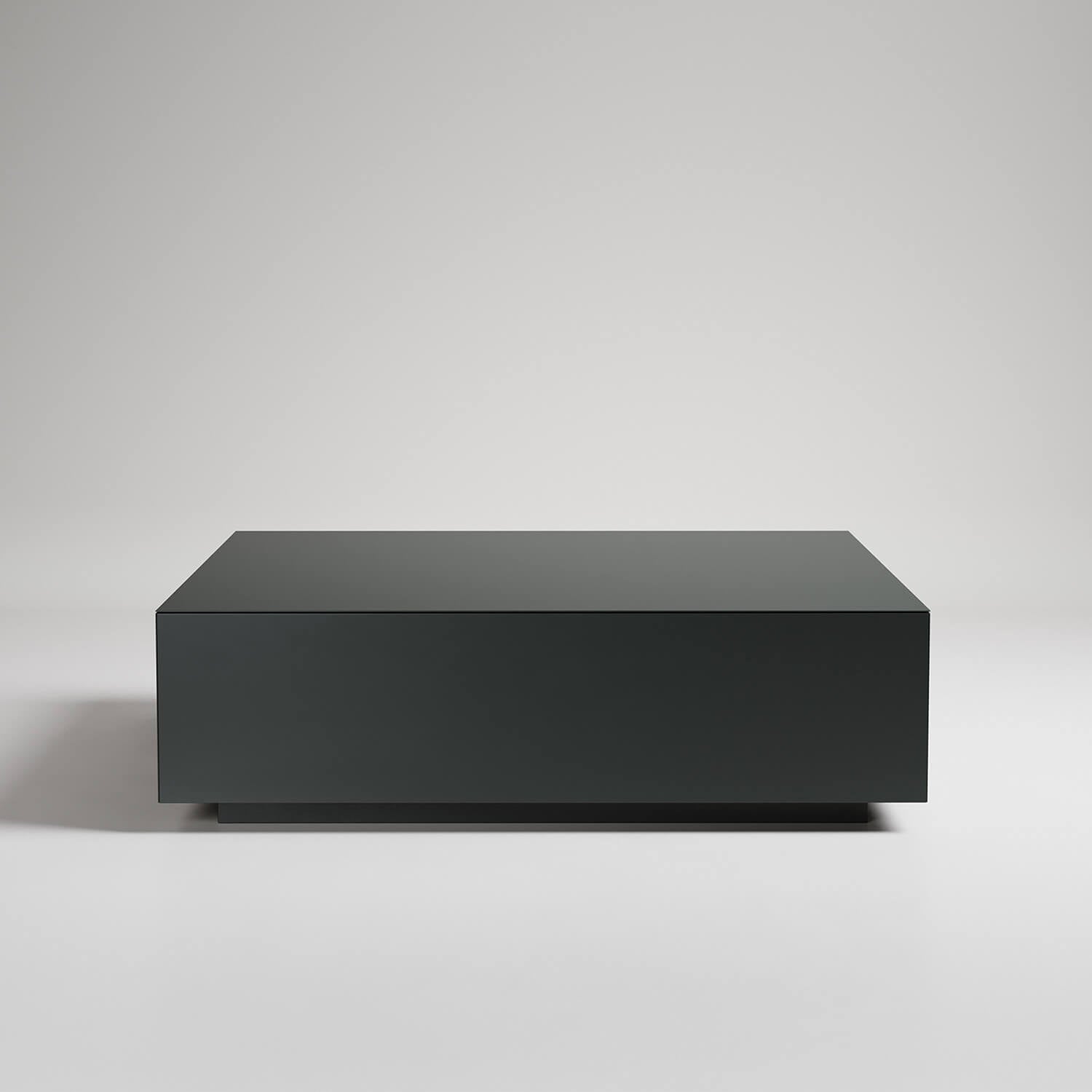 Minimalist dark gray rectangular coffee table with floating base design against white background