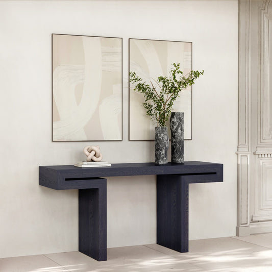 A beautiful picture of a Black Console Table, its slender form marrying elegance with utility.