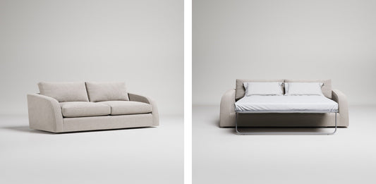 Pull-out sofa bed with plush cushions for guest comfort