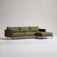 Modern olive green sectional sofa with chaise lounge and black metal legs on light gray background
