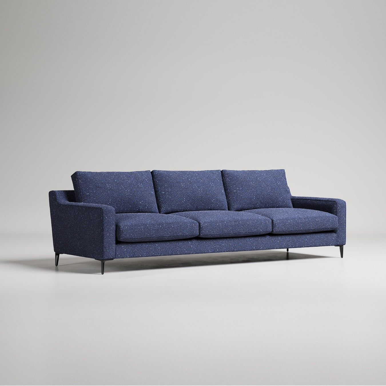blue three seater sofa with slim black legs