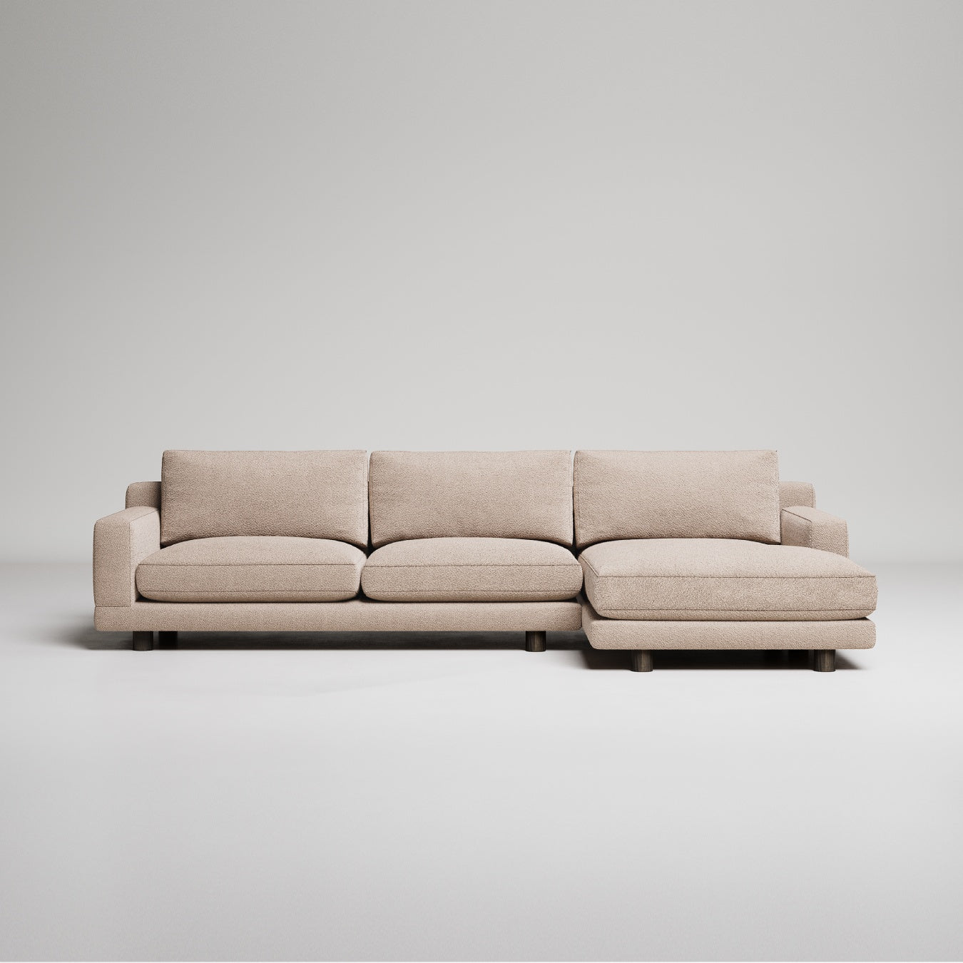 Beige sectional sofa on a light gray background