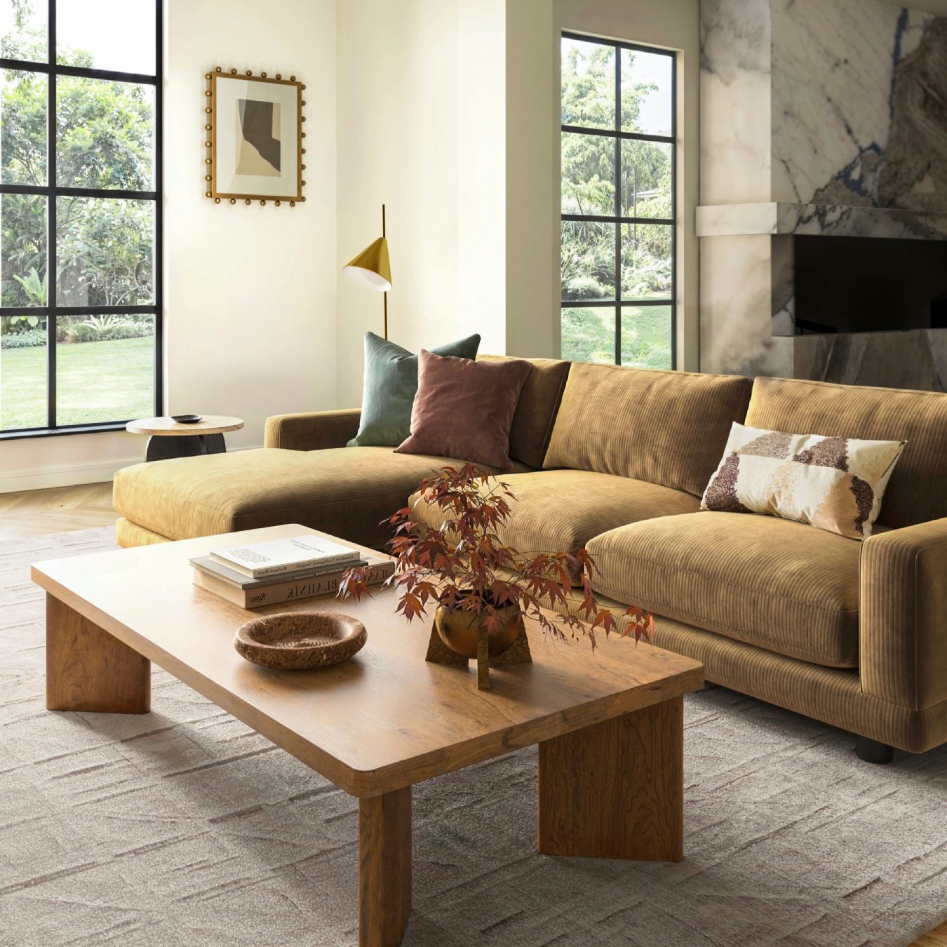 Living room with a brown sectional sofa, wooden coffee table, and decorative elements.