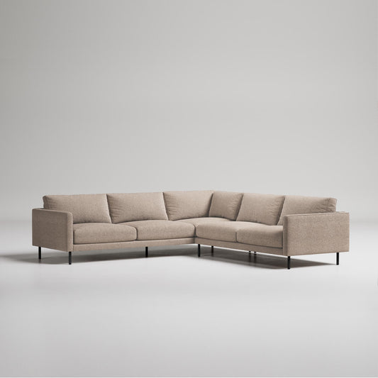Cream modular sofa with black cylindrical legs