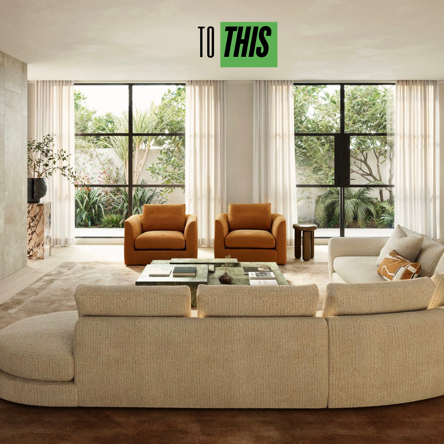 Finished living room with MOMU custom sofa and armchairs arranged to plan — to this
